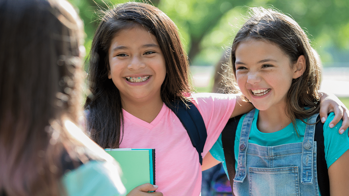 children with backpacks