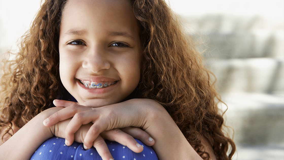 child with braces